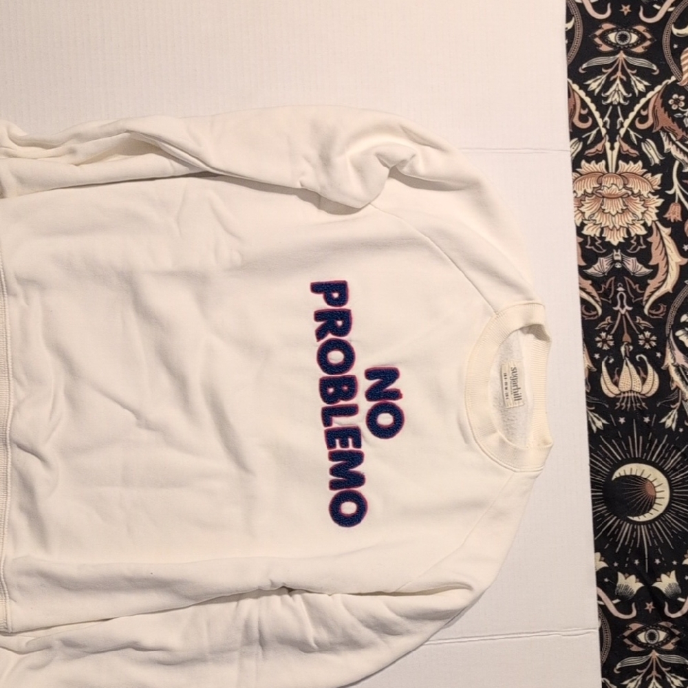 White Sugarhill Sweatshirt with 'No Problemo' Text